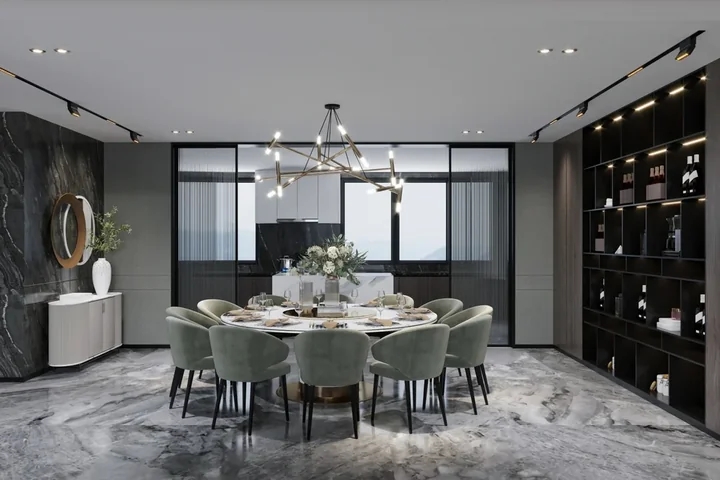 Piękny nowoczesny salon z okrągłym stołem przy którym umiejscowiono szare krzesła